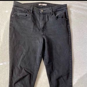 Levis black skinny jeans 721